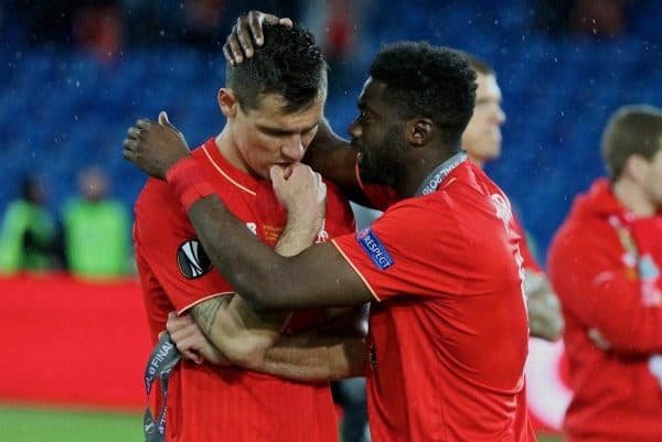 BASEL, SWITZERLAND - Wednesday, May 18, 2016: Liverpool's Dejan Lovren is consoled by Kolo Toure after losing 3-1 to Sevilla during the UEFA Europa League Final at St. Jakob-Park. (Pic by David Rawcliffe/Propaganda)