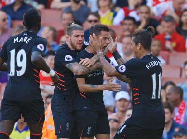 LONDON, ENGLAND - Sunday, August 14, 2016: Liverpool's Philippe Coutinho Correia celebrates scoring the first equalising goal against Arsenal with team-mates Alberto Moreno [L] and Roberto Firmino [R] during the FA Premier League match at the Emirates Stadium. (Pic by David Rawcliffe/Propaganda)