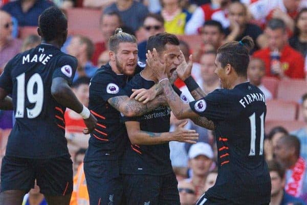 LONDON, ENGLAND - Sunday, August 14, 2016: Liverpool's Philippe Coutinho Correia celebrates scoring the first equalising goal against Arsenal with team-mates Alberto Moreno [L] and Roberto Firmino [R] during the FA Premier League match at the Emirates Stadium. (Pic by David Rawcliffe/Propaganda)