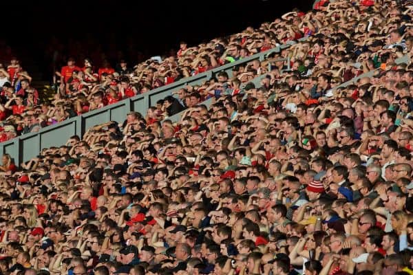 LIVERPOOL, ENGLAND - Saturday, September 10, 2016: Liverpool supporters shield their eyes from the sun during the FA Premier League match against Leicester City at Anfield. (Pic by David Rawcliffe/Propaganda)