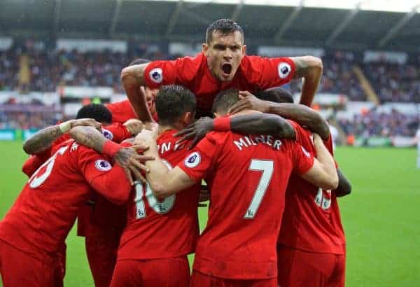 LIVERPOOL, ENGLAND - Saturday, October 1, 2016: Liverpool's Dejan Lovren jumps on the huddle as James Milner celebrates scoring the second goal against Swansea City from the penalty spot to make the score 2-1 during the FA Premier League match at the Liberty Stadium. (Pic by David Rawcliffe/Propaganda)