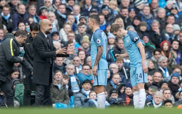 MANCHESTER, ENGLAND - Saturday, December 3, 2016: Manchester City's Manager Pep Guardiola gives instructions to Aleksandar Kolarov and John Stones during the FA Premier League match against Chelsea at the City of Manchester Stadium. (Pic by Gavin Trafford/Propaganda)