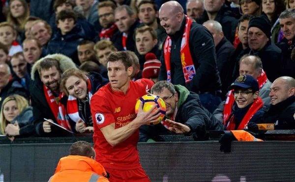 LIVERPOOL, ENGLAND - Sunday, December 11, 2016: Liverpool's James Milner gets the ball from the crowd to take a throw-in during the FA Premier League match against West Ham United at Anfield. (Pic by David Rawcliffe/Propaganda)