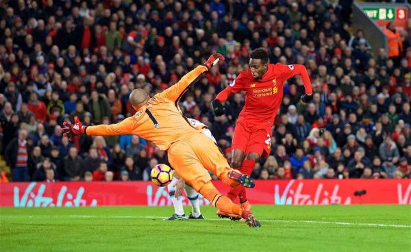 LIVERPOOL, ENGLAND - Sunday, December 11, 2016: Liverpool's Divock Origi scores the second goal against West Ham United after a mistake but goalkeeper Darren Randolph to make the score 2-2 during the FA Premier League match at Anfield. (Pic by David Rawcliffe/Propaganda)