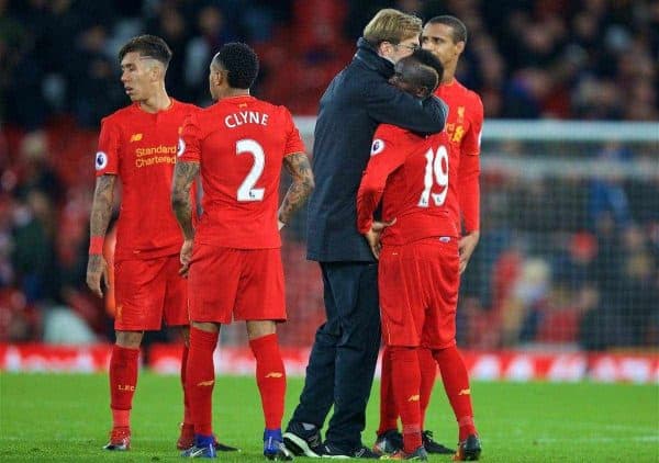 LIVERPOOL, ENGLAND - Sunday, December 11, 2016: Liverpool's manager Jürgen Klopp embraces Sadio Mane after the 2-2 home draw with West Ham United during the FA Premier League match at Anfield. (Pic by David Rawcliffe/Propaganda)