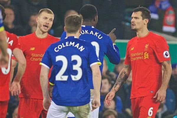 LIVERPOOL, ENGLAND - Monday, December 19, 2016: Liverpool's Dejan Lovren clashes with Everton's Romelu Lukaku during the FA Premier League match, the 227th Merseyside Derby, at Goodison Park. (Pic by David Rawcliffe/Propaganda)