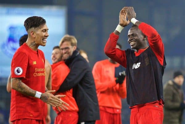LIVERPOOL, ENGLAND - Monday, December 19, 2016: Liverpool's Roberto Firmino celebrates with goal-scoring match-winner Sadio Mane after the 1-0 victory over Everton during the FA Premier League match, the 227th Merseyside Derby, at Goodison Park. (Pic by David Rawcliffe/Propaganda)