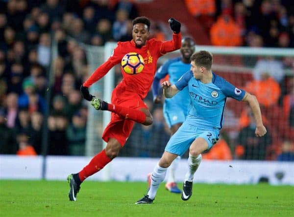 LIVERPOOL, ENGLAND - Saturday, December 31, 2016: Liverpool's Divock Origi in action against Manchester City's Martin Demichelis during the FA Premier League match at Anfield. (Pic by David Rawcliffe/Propaganda)