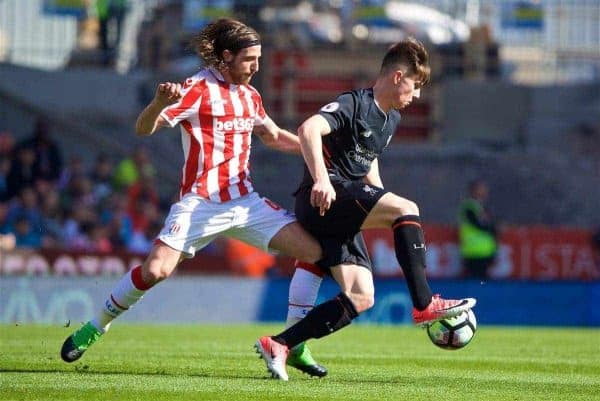 STOKE-ON-TRENT, ENGLAND - Saturday, April 8, 2017: Liverpool's Ben Woodburn in action against his Wales international team-mate Stoke City's Joe Allen during the FA Premier League match at the Bet365 Stadium. (Pic by David Rawcliffe/Propaganda)