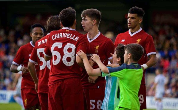 BIRKENHEAD, ENGLAND - Wednesday, July 12, 2017: Young supporters run on to celebrate Liverpool's third goal against Tranmere Rovers during a preseason friendly match at Prenton Park. (Pic by David Rawcliffe/Propaganda)