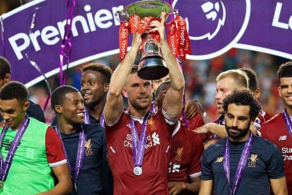 HONG KONG, CHINA - Saturday, July 22, 2017: Liverpool's captain Jordan Henderson lifts the trophy after beating Leicester City 2-1 during the Premier League Asia Trophy final match between Liverpool and Leicester City at the Hong Kong International Stadium. (Pic by David Rawcliffe/Propaganda)