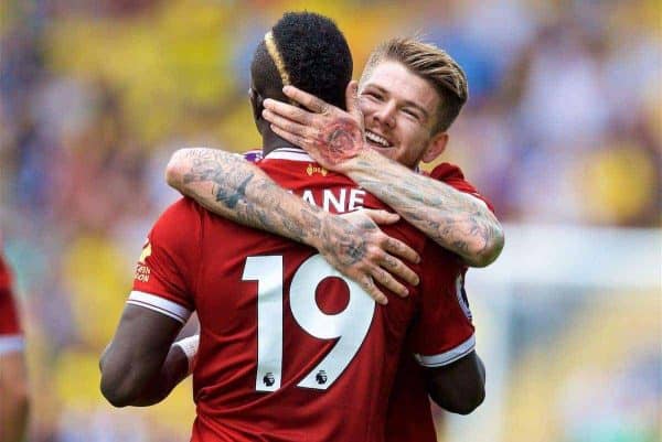 WATFORD, ENGLAND - Saturday, August 12, 2017: Liverpool's Sadio Mane celebrates scoring the first equalising goal with team-mate Alberto Moreno during the FA Premier League match between Watford and Liverpool at Vicarage Road. (Pic by David Rawcliffe/Propaganda)