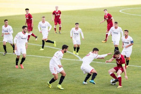 BIRKENHEAD, ENGLAND - Wednesday, September 13, 2017: Liverpool's captain Ben Woodburn has eight Sevilla players close him down during the UEFA Youth League Group E match between Liverpool and Sevilla at Prenton Park. (Pic by Paul Greenwood/Propaganda)
