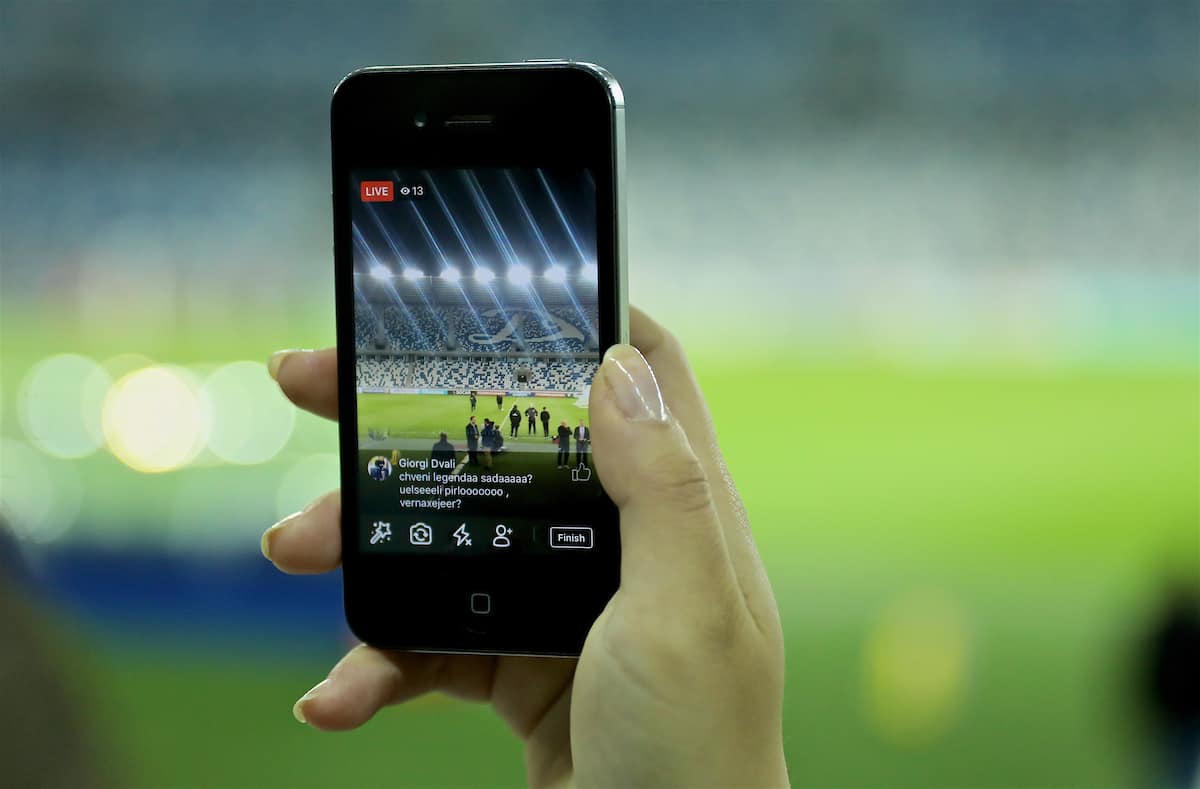 TBILSI, GEORGIA - Thursday, October 5, 2017: A Georgian journalists uses Facebook Live to broadcast Wales' training session at the Boris Paichadze Dinamo Arena ahead of the 2018 FIFA World Cup Qualifying Group D match between Georgia and Wales. (Pic by David Rawcliffe/Propaganda)