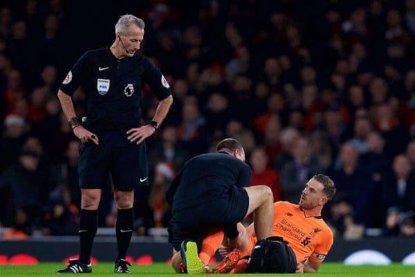 LONDON, ENGLAND - Friday, December 22, 2017: Liverpool's captain Jordan Henderson receives treatment for an injury during the FA Premier League match between Arsenal and Liverpool at the Emirates Stadium. (Pic by David Rawcliffe/Propaganda)