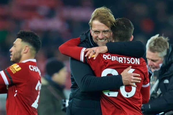 LIVERPOOL, ENGLAND - Sunday, January 14, 2018: Liverpool's manager Jürgen Klopp celebrates with Andy Robertson after his side's 4-3 victory during the FA Premier League match between Liverpool and Manchester City at Anfield. (Pic by David Rawcliffe/Propaganda)