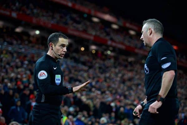 LIVERPOOL, ENGLAND - Sunday, February 4, 2018: Assistant referee Eddie Smart tries to impose a penalty for Tottenham Hotspur onto referee Jonathan Moss during the FA Premier League match between Liverpool FC and Tottenham Hotspur FC at Anfield. (Pic by David Rawcliffe/Propaganda)