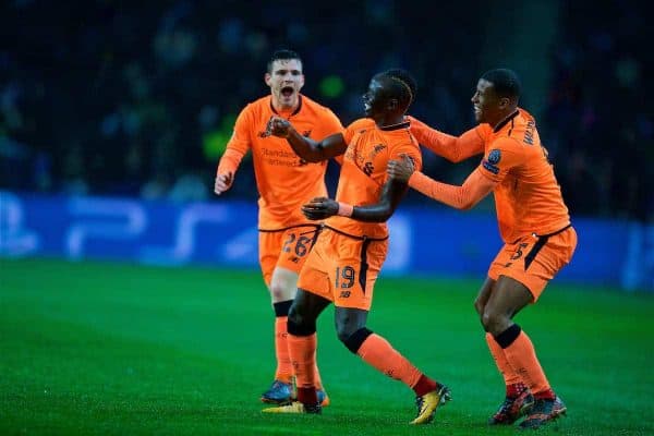 PORTO, PORTUGAL - Wednesday, February 14, 2018: Liverpool's Sadio Mane celebrates scoring the first goal with team-mates Andy Robertson and Georginio Wijnaldum during the UEFA Champions League Round of 16 1st leg match between FC Porto and Liverpool FC on Valentine's Day at the Estádio do Dragão. (Pic by David Rawcliffe/Propaganda)