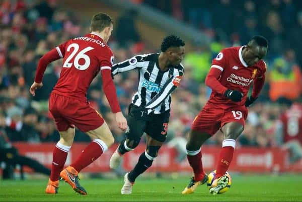 LIVERPOOL, ENGLAND - Saturday, March 3, 2018: Liverpool's Sadio Mane Newcastle United's Christian Atsu during the FA Premier League match between Liverpool FC and Newcastle United FC at Anfield. (Pic by Peter Powell/Propaganda)