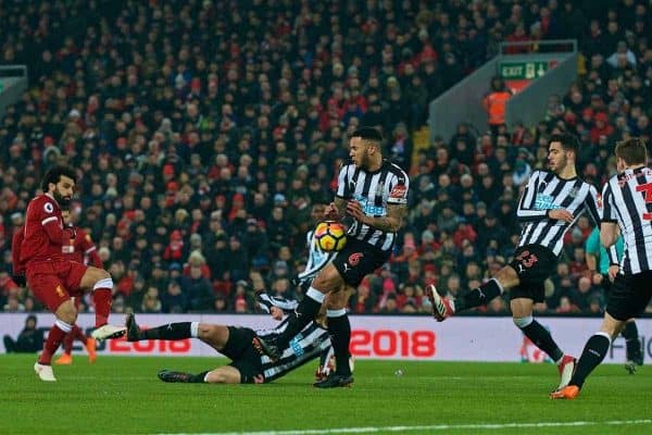 LIVERPOOL, ENGLAND - Saturday, March 3, 2018: Liverpool's Mohamed Salah sees his shot blocked by the arm of Newcastle United's captain Jamaal Lascelles during the FA Premier League match between Liverpool FC and Newcastle United FC at Anfield. (Pic by Peter Powell/Propaganda)