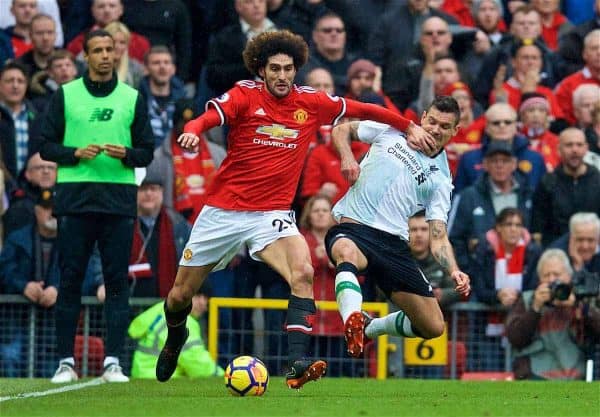 MANCHESTER, ENGLAND - Saturday, March 10, 2018: Manchester United's Marouane Fellaini and Liverpool's Dejan Lovren during the FA Premier League match between Manchester United FC and Liverpool FC at Old Trafford. (Pic by David Rawcliffe/Propaganda)