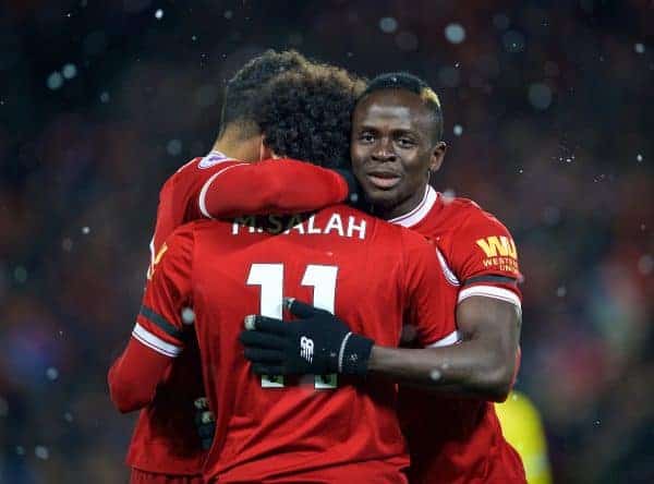 LIVERPOOL, ENGLAND - Saturday, March 17, 2018: Liverpool's Mohamed Salah celebrates scoring the fourth goal, the third of his hat-trick, with team-mates Alex Oxlade-Chamberlain (left) and Sadio Mane (right) during the FA Premier League match between Liverpool FC and Watford FC at Anfield. (Pic by David Rawcliffe/Propaganda)