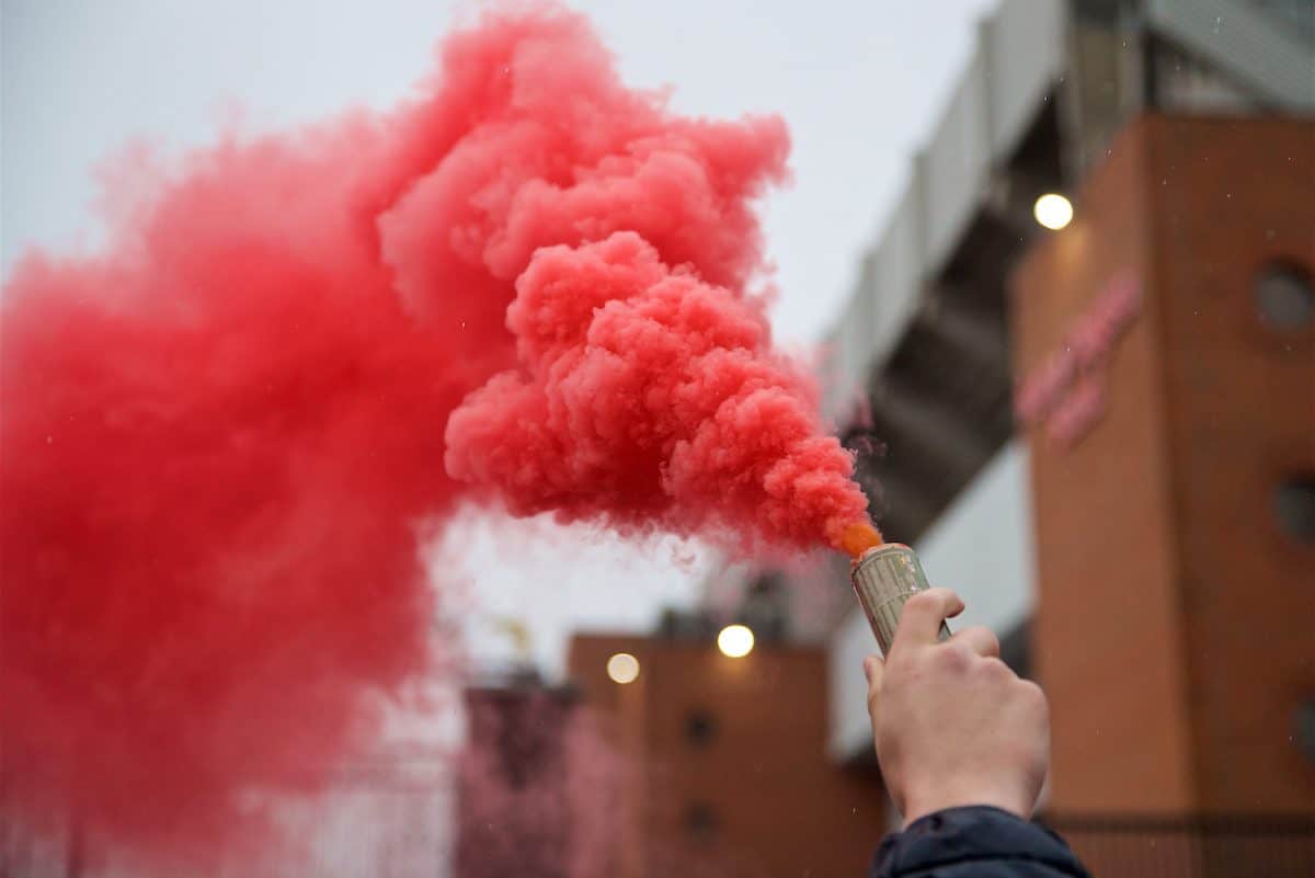 LIVERPOOL, ENGLAND - Tuesday, April 24, 2018: Liverpool supporters with a red smoke bomb before the UEFA Champions League Semi-Final 1st Leg match between Liverpool FC and AS Roma at Anfield. (Pic by David Rawcliffe/Propaganda)