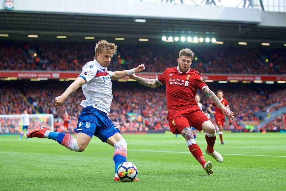 LIVERPOOL, ENGLAND - Saturday, April 28, 2018: Liverpool's Alberto Moreno and Stoke City's Phil Bardsley during the FA Premier League match between Liverpool FC and Stoke City FC at Anfield. (Pic by David Rawcliffe/Propaganda)