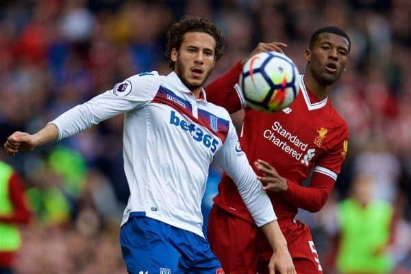 LIVERPOOL, ENGLAND - Saturday, April 28, 2018: Liverpool's Georginio Wijnaldum and Stoke City's Ramadan Sobhi during the FA Premier League match between Liverpool FC and Stoke City FC at Anfield. (Pic by David Rawcliffe/Propaganda)