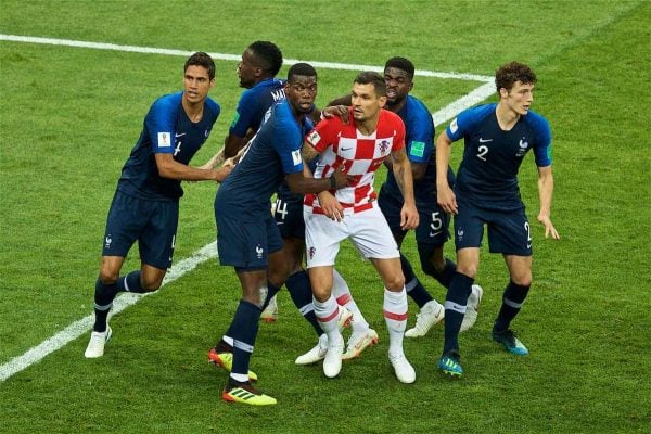 MOSCOW, RUSSIA - Sunday, July 15, 2018: Croatia's Dejan Lovren is surrounded by France players during the FIFA World Cup Russia 2018 Final match between France and Croatia at the Luzhniki Stadium. (Pic by David Rawcliffe/Propaganda)