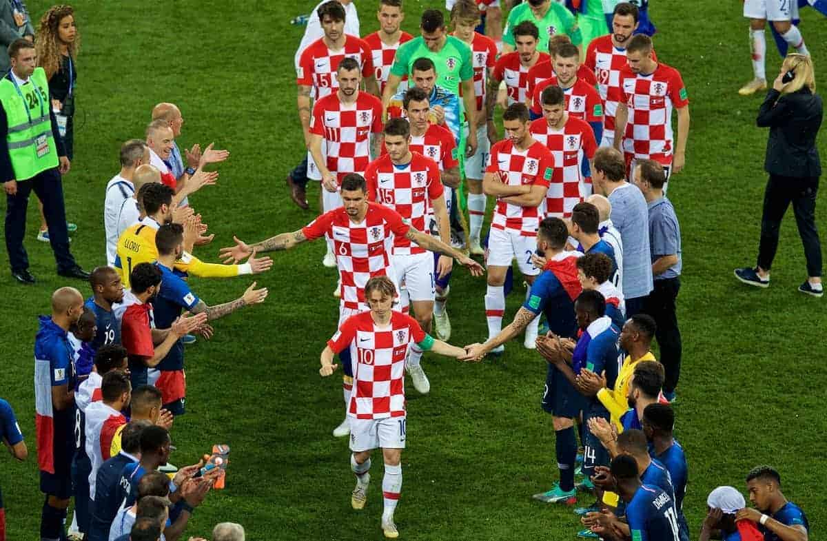 MOSCOW, RUSSIA - Sunday, July 15, 2018: Croatia's captain Luka Modri? and Dejan Lovren walk through a Guard of Honour from the France players after the FIFA World Cup Russia 2018 Final match between France and Croatia at the Luzhniki Stadium. France won 4-2. (Pic by David Rawcliffe/Propaganda)