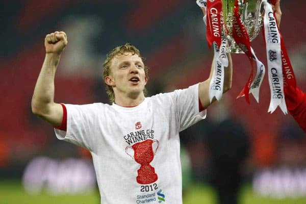 Liverpool's Dirk Kuyt, of the Netherlands, lifts the English League Cup after his team defeated Cardiff City at the final soccer match at Wembley Stadium, in London, Sunday, Feb. 26, 2012. (AP Photo/Tim Hales)