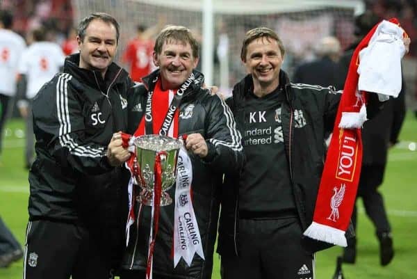 Liverpool's manager Kenny Dalglish (centre), First-team Coaches Steve Clarke (left) and Kevin Keen (right) with the Carling Cup trophy