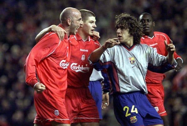 Liverpool's Gary McAllister (left) celebrates his goal scored from the penalty spot with team mate Steven Gerrard as Barcelona's Carles Puyol (right) looks on during the UEFA Cup semi-final second leg match at Anfield, Liverpool.