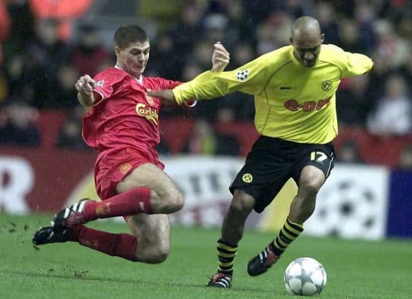 Liverpool's Steven Gerrard (left) tackles Dede of Borussia Dortmund, during the Champions League group B match at Anfield, Liverpool.  (Picture by: Phil Noble / PA Archive/Press Association Images)
