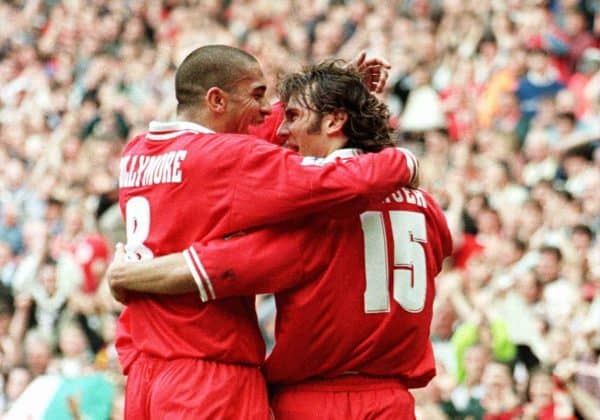 Liverpool's Stan Collymore congratulates Patrik Berger on his winning goal
