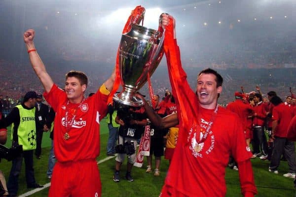 Liverpool's Steven Gerrard (l) and Jamie Carragher celebrate with the trophy