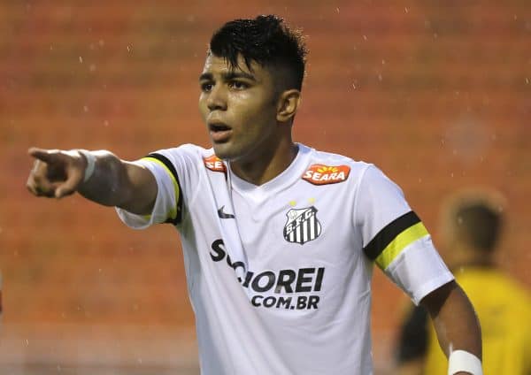 In this Jan. 21, 2014 photo, Santos' Gabriel Barbosa reacts during a Campeonato Paulista soccer game at Pacaembu stadium, in Sao Paulo, Brazil. Santos striker Gabriel Barbosa doesn¬ít like the comparison, but Brazilians see him as the next Neymar. How¬ís that for pressure? The 19-year-old Barbosa, who is known universally as ¬ìGabigol,¬î is ranked as Brazil¬ís most promising player. (AP Photo/Nelson Antoine)