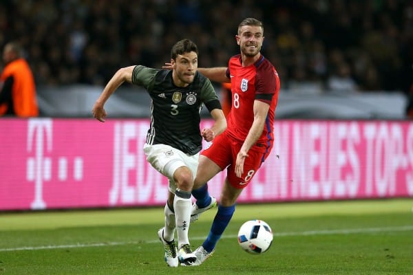 England's Jordan Henderson and Germany's Jonas Hector (left) in action during the International Friendly match at the Olympic Stadium, Berlin. PRESS ASSOCIATION Photo. Picture date: Saturday March 26, 2016. See PA story SOCCER Germany. Photo credit should read: Adam Davy/PA Wire.