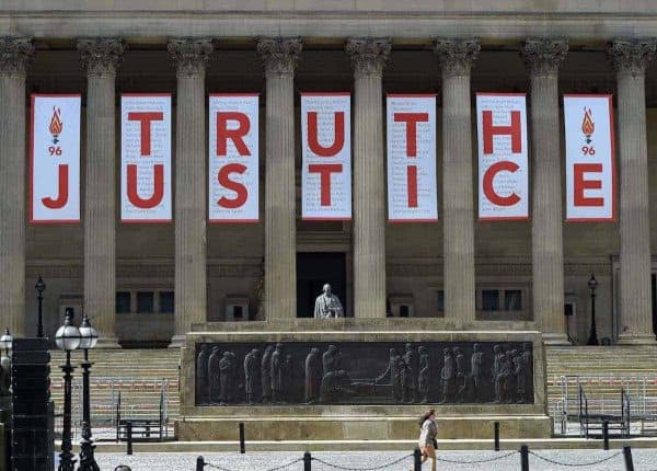 A giant banner is unveiled at St George's Hall in Liverpool after the inquest jury ruled the 96 victims in the Hillsborough disaster had been unlawfully killed. (Picture by: PA / PA Wire/Press Association Images)