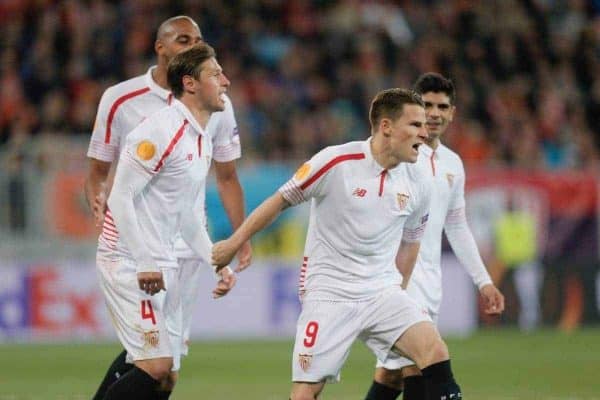 Sevilla¬ís Kevin Gameiro, second right, celebrates scoring his side's second goal from a penalty during semifinal first leg of the Europa League soccer match, between FC Shakhtar Donetsk and Sevilla at Arena Lviv stadium in Lviv, western Ukraine, Thursday, April 28, 2016. (AP Photo/Efrem Lukatsky)