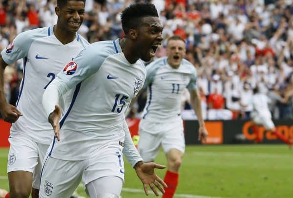 England's Daniel Sturridge, front, celebrates after scoring his side¬ís second goal during the Euro 2016 Group B soccer match between England and Wales at the Bollaert stadium in Lens, France, Thursday, June 16, 2016. Behind are Marcus Rashford, left, and Jamie Vardy. (AP Photo/Kirsty Wigglesworth)