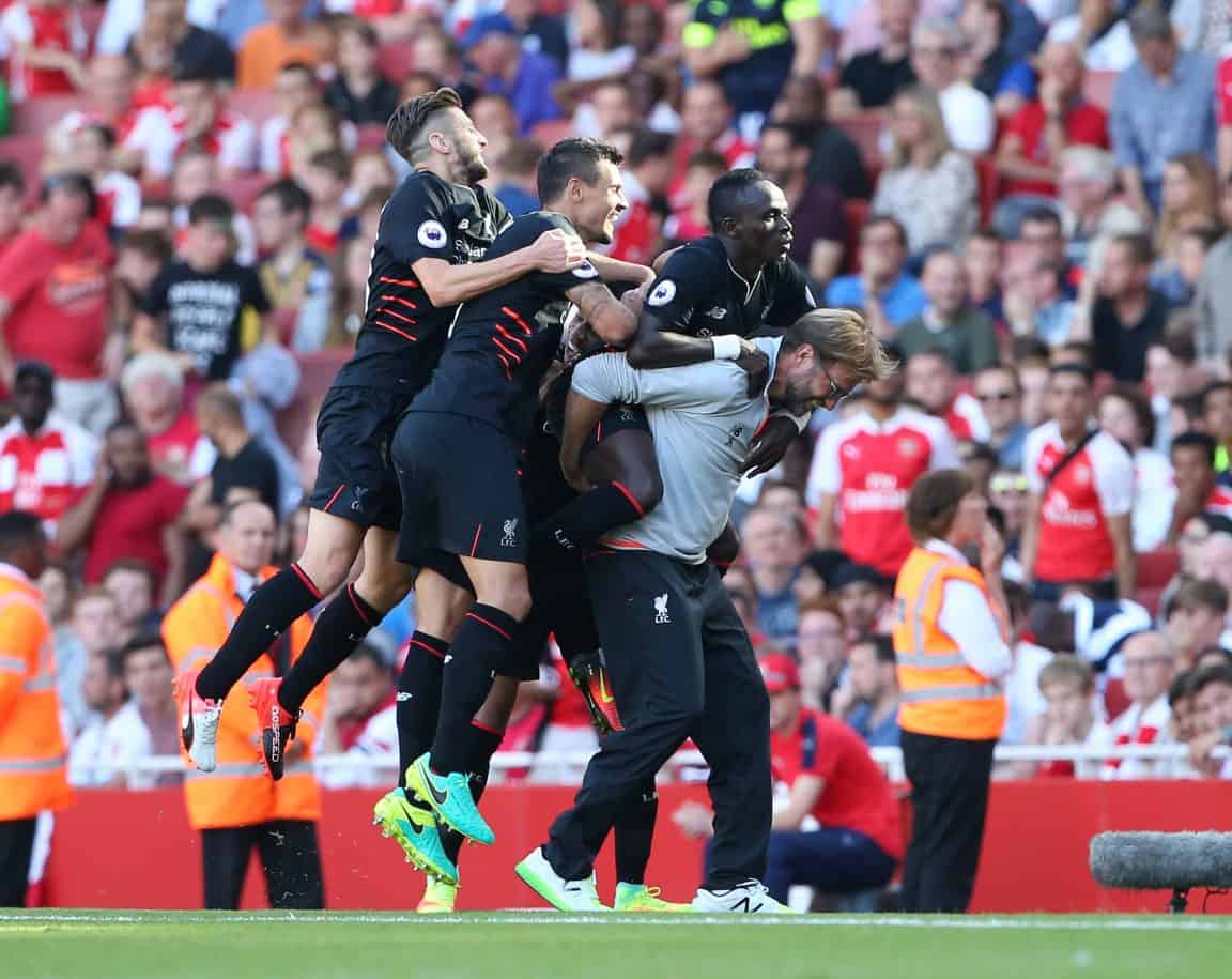 Liverpool's Sadio Mane celebrates scoring his sides fourth goal with Jurgen Klopp during the Premier League match at the Emirates Stadium, London. Picture date August 14th, 2016 Pic David Klein/Sportimage via PA Images