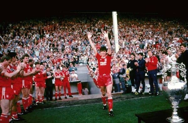 Liverpool captain Alan Hansen accepts the applause of the crowd and his teammates as he walks out to lift the League Championship trophy (Picture by: Peter Robinson / EMPICS Sport)