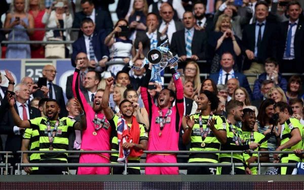 Huddersfield Town goalkeeper Danny Ward lifts the trophy after winning the Sky Bet Championship play-off final at Wembley Stadium, London. PRESS ASSOCIATION Photo. Picture date: Monday May 29, 2017. See PA Story SOCCER Final. Photo credit should read: Nick Potts/PA Wire. RESTRICTIONS: EDITORIAL USE ONLY No use with unauthorised audio, video, data, fixture lists, club/league logos or "live" services. Online in-match use limited to 75 images, no video emulation. No use in betting, games or single club/league/player publications.