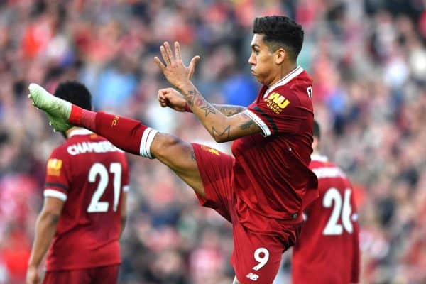 Liverpool's Roberto Firmino celebrates scoring his side's third goal of the game during the Premier League match at Anfield, Liverpool.