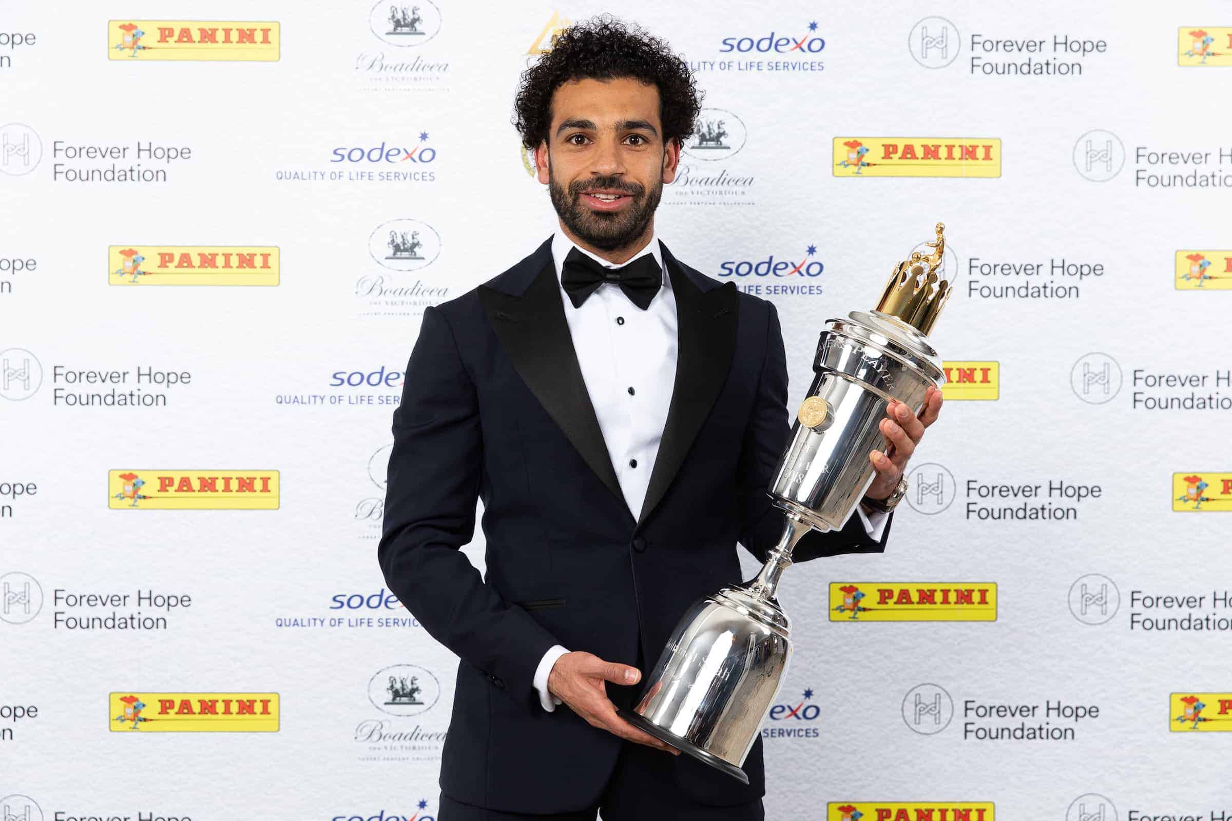 Liverpool's Mohamed Salah poses with the PFA Player Of The Year Award Trophy during the 2018 PFA Awards at the Grosvenor House Hotel, London