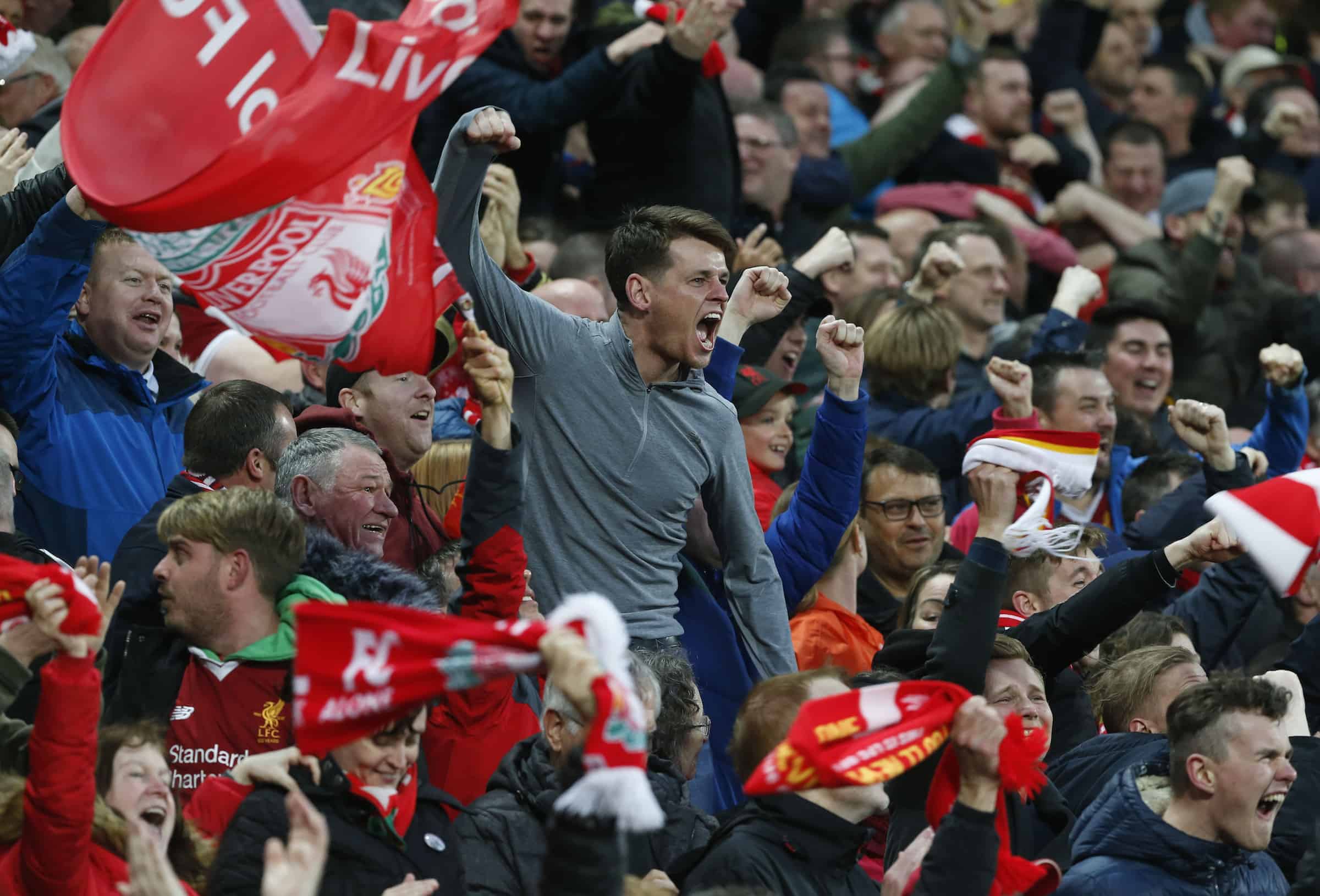 (180425) -- LIVERPOOL, April 25, 2018(Xinhua) -- Supporters of Liverpool celebrate a goal during the UEFA Champions League Semi-finals 1st leg match between Liverpol FC and AS Roma at the Anfield Stadium in Liverpool, Britain on April 24, 2018. Liverpool won 5-2. (Xinhua/Han Yan)(wll)