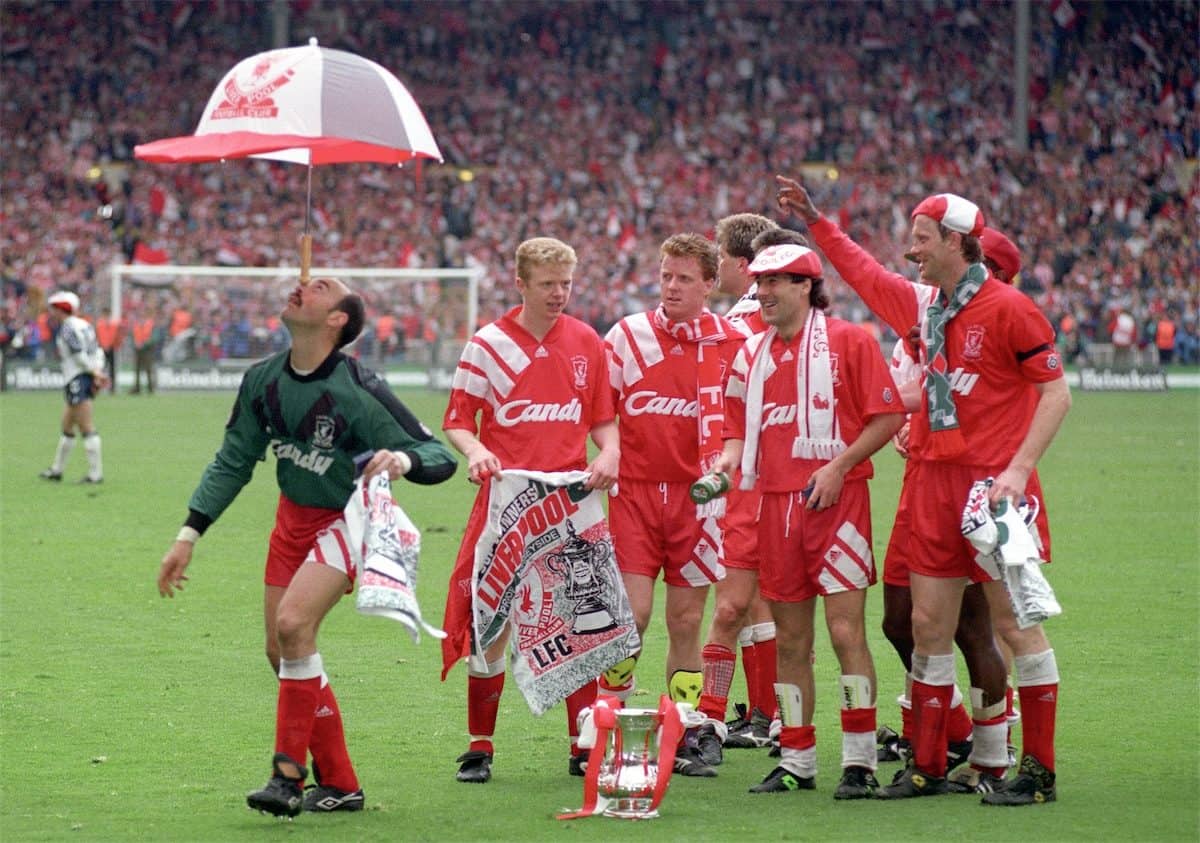Bruce Grobbelaar clowns around as the Liverpool team celebrate their FA Cup win in 1992 (Picture by: Ross Kinnaird / EMPICS Sport)