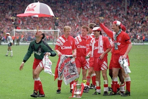 Bruce Grobbelaar clowns around as the Liverpool team celebrate their FA Cup win in 1992 (Picture by: Ross Kinnaird / EMPICS Sport)